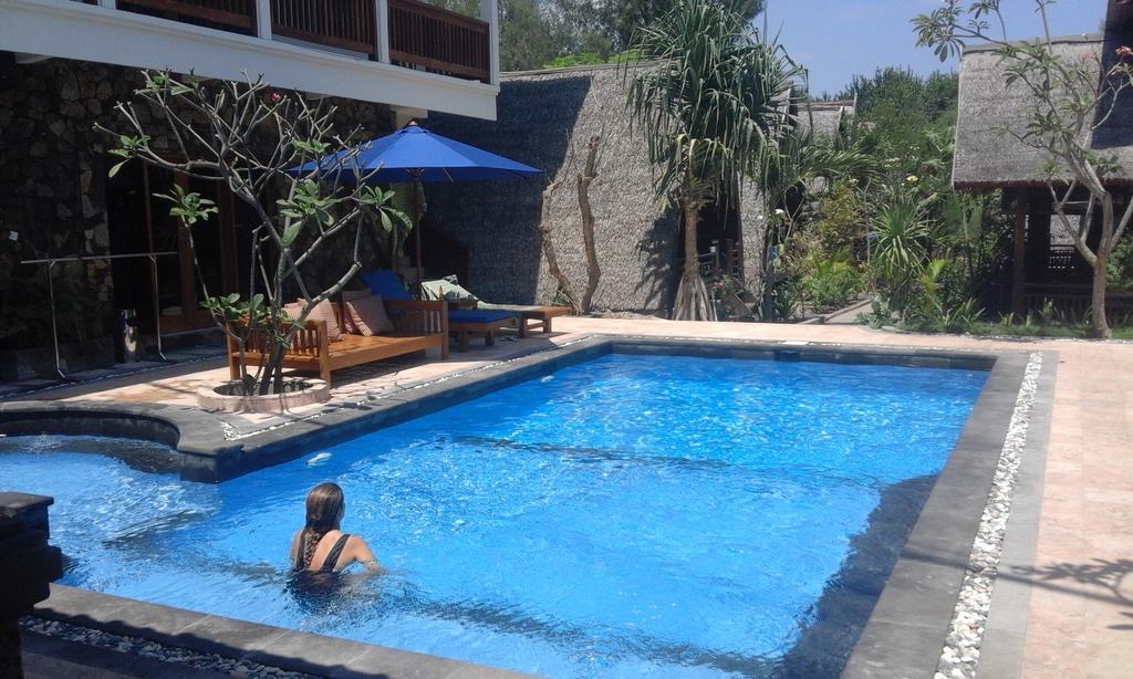 Coral Beach Pizza Cottages Τζίλι Τραγουανγκάν Εξωτερικό φωτογραφία