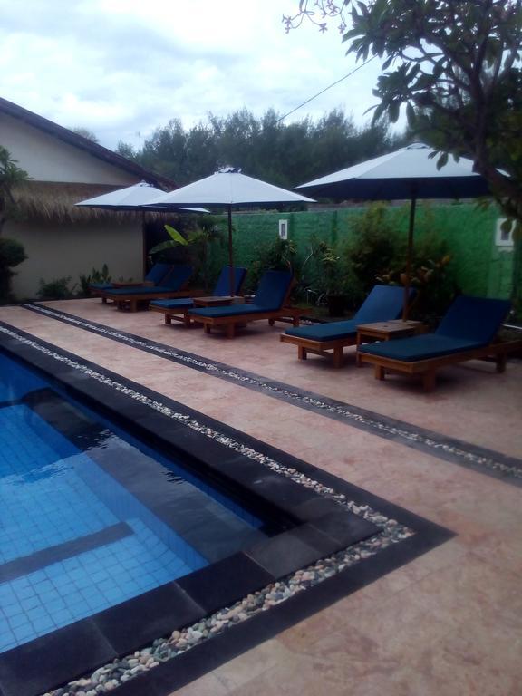 Coral Beach Pizza Cottages Τζίλι Τραγουανγκάν Εξωτερικό φωτογραφία